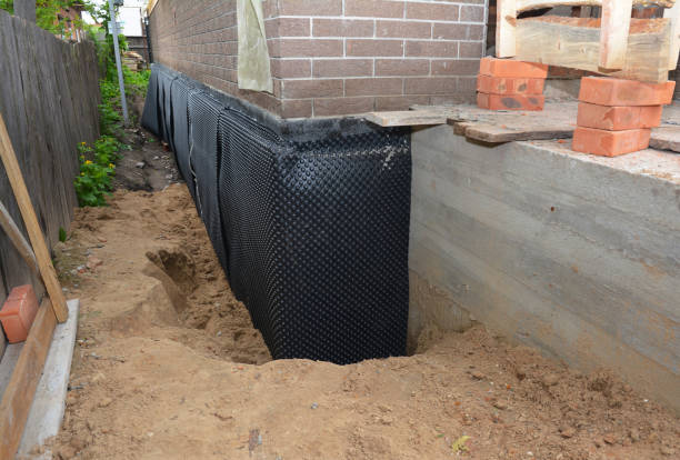 Happy homeowners after waterproofing job in Lookout Mountain